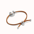 Pulsera de hilo marr&oacute;n con perla shell fornitura ba&ntilde;ada en plata de ley